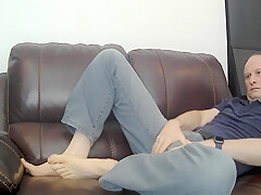 Kudoslong On The Sofa Strips Naked His Hairy Cock Becoming Erect As He Masturbates Thrusting And Showing His Anus